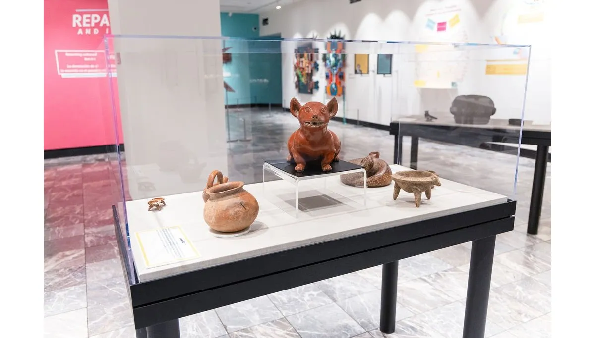 Pre-Columbian artifacts, including a ceramic sculpture of a 