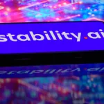 The Stability logo is being displayed on a smartphone in this photo illustration in Brussels, Belgium, on June 10, 2024. (Photo Illustration by Jonathan Raa/NurPhoto via Getty Images)