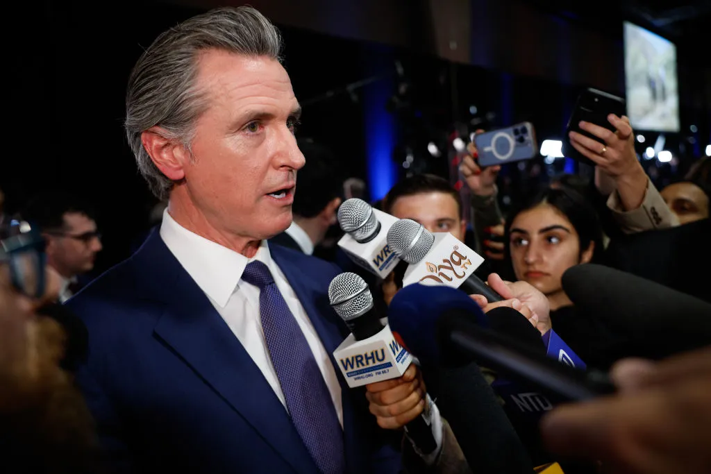 PHILADELPHIA, PENNSYLVANIA - SEPTEMBER 10: Governor of California Gavin Newsom speaks to reporters in the spin room following the presidential debate between Republican presidential nominee, former U.S. President Donald Trump and Democratic presidential nominee, U.S. Vice President Kamala Harris at The National Constitution Center on September 10, 2024 in Philadelphia, Pennsylvania. After earning the Democratic Party nomination following President Joe Biden