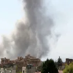 Smoke billows from a Roman temple.