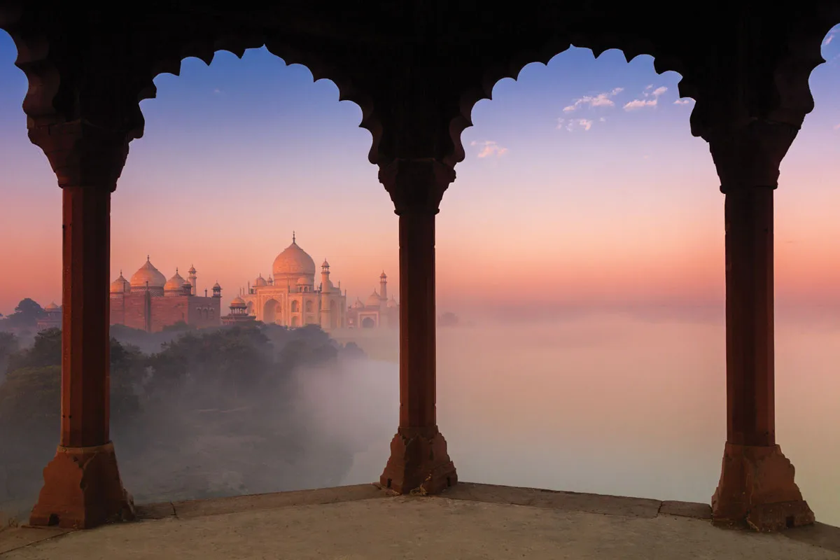 The Taj Mahal seen through arches.