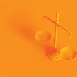 Conceptual image. Scales of justice isolated on orange background.